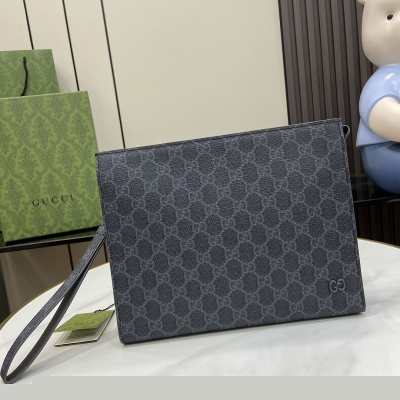 G*u*i clutch bags